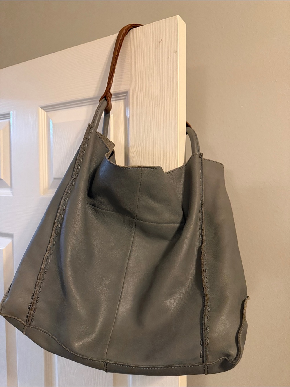 Gray Leather Hobo Bag with Brown Strap